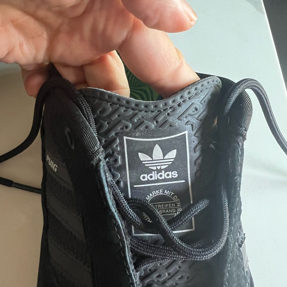 Women’s adidas Puig all black sneaker